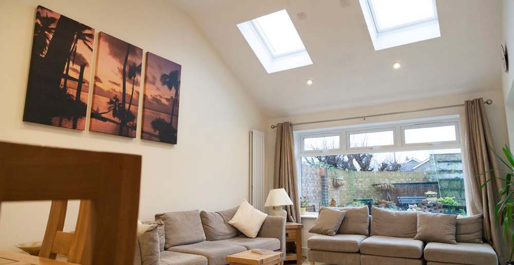 Image linking to the Extension in Galleywood page for details of  and the  on offer there: This unusual room was created in line with the customer's designs and ideas to extend their property in Galleywood, Essex and make additional, comfortable space for family living.  The line of the pitched roof was followed to give maximum height and an airy feel to the space.